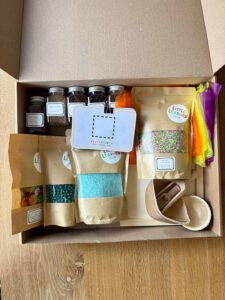 Sensorische ontdekbox Little Learner Club verpakking herbruikbaar cadeau